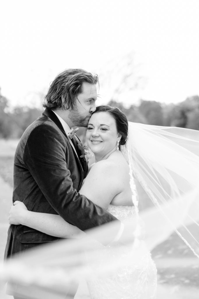 black and white photo of bride and groom